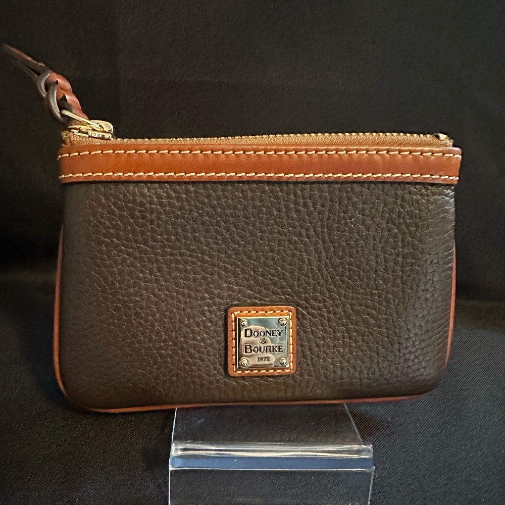 AUTHENTIC Dooney & Bourke coin pouch.  NEW. never used.